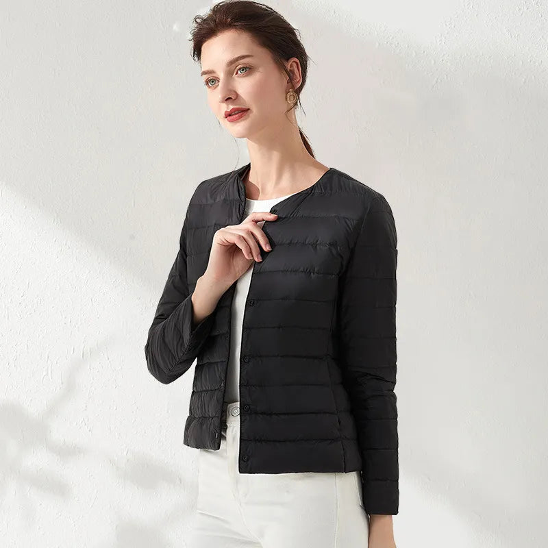 Women's lightweight collarless slimming puffer jacket. Essential everyday outerwear for fall & spring.