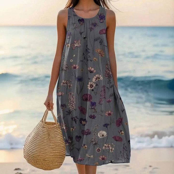 Casual women's floral print midi dress with a comfortable loose fit & round neck, ideal for summer.