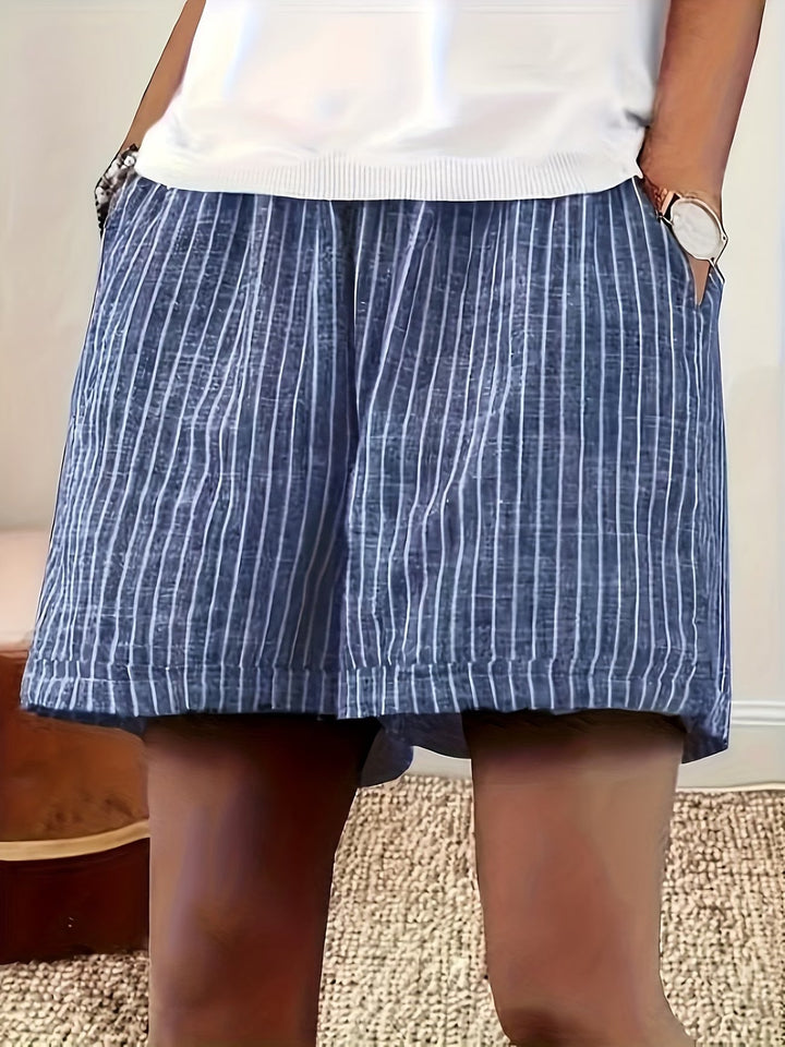 Relaxed fit women's striped shorts, ideal for beachwear or holiday style with an elastic waist.