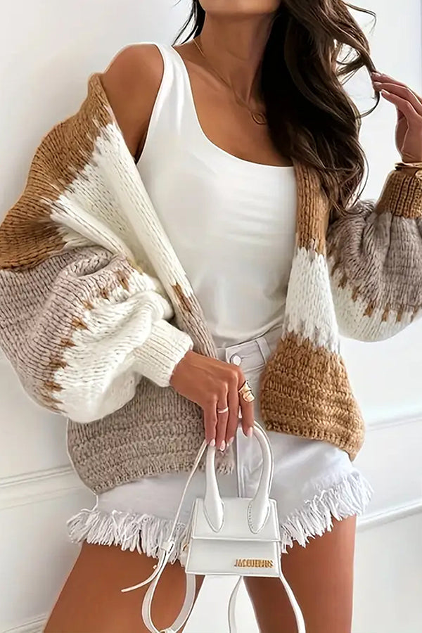 Women's cozy knit cardigan top with v-neck, long sleeves & stylish contrast seams.
