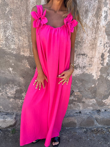 Elegant women's flowing U-neck maxi dress with delicate bow straps, perfect for summer vacations & parties.