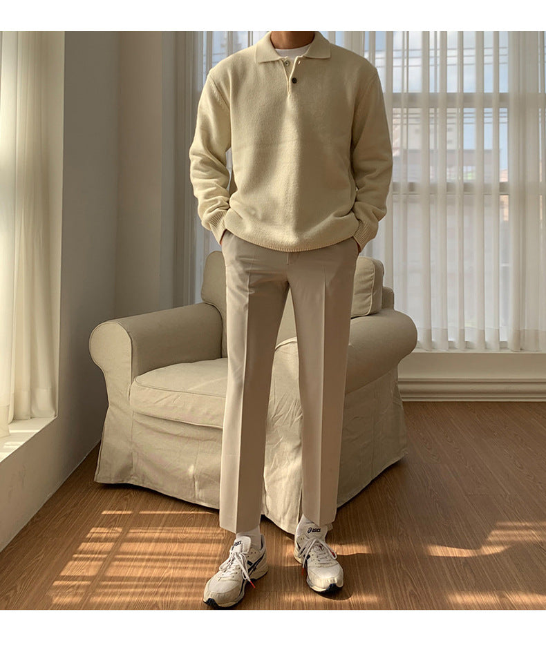 Essential men's fall fashion: a ribbed knit polo sweater. Long sleeve pullover for warmth & smart casual style.