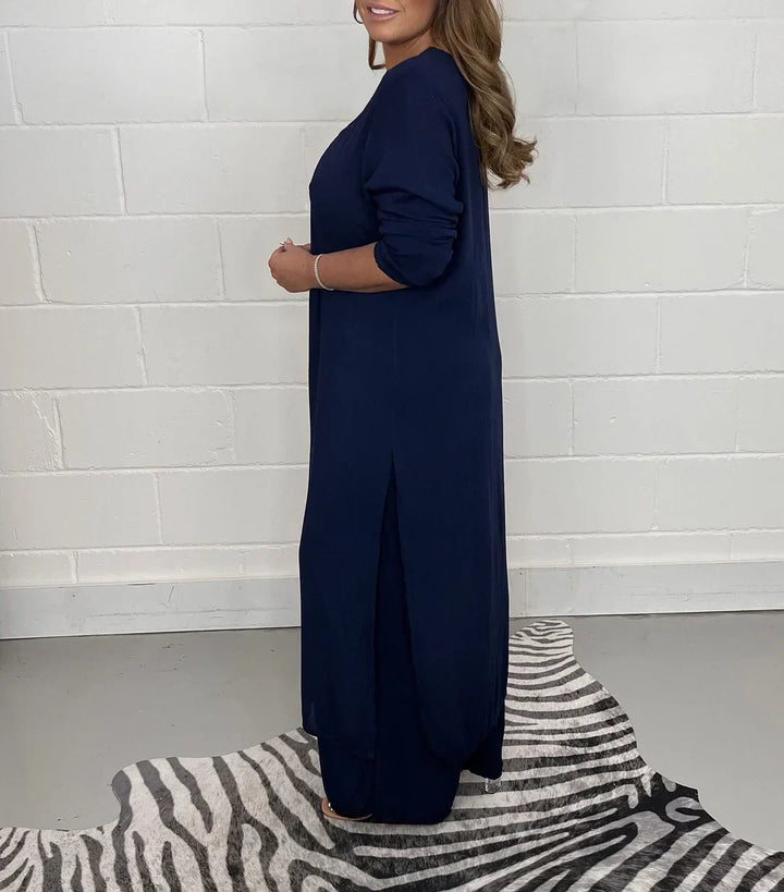 Relaxed fit women's V-neck long sleeve top and pants set. Ideal for casual wear, comfortable autumn outfit.