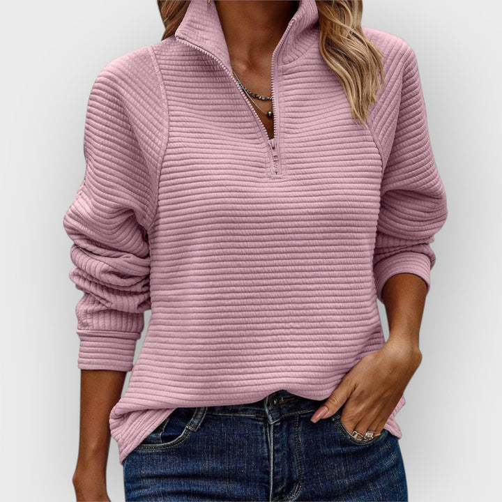 Women's comfortable V-neck zipper jumper. Soft long sleeve knitwear for elegant casual wear.