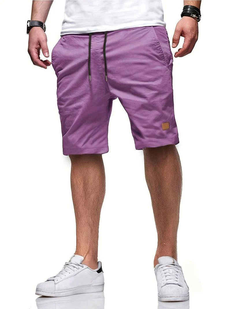 Soft, comfortable men's drawstring shorts, perfect for casual summer days & lounging.