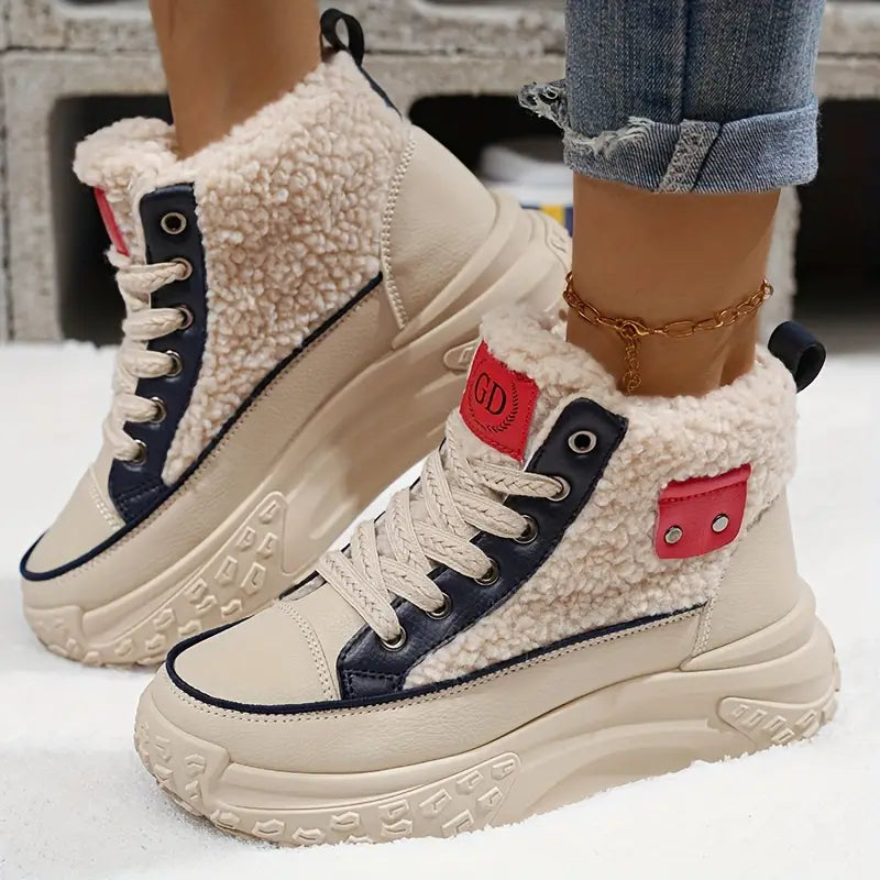 Close-up of soft, faux-fur lining in women's cozy snow boots, perfect for warm, casual winter style.