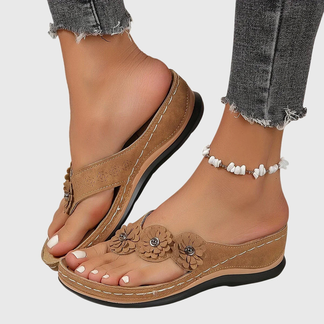 Orthopedic flip flops for women offering foot pain relief, arch support, and comfortable summer wear.