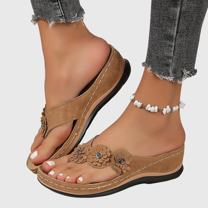 Orthopedic flip flops for women offering foot pain relief, arch support, and comfortable summer wear.