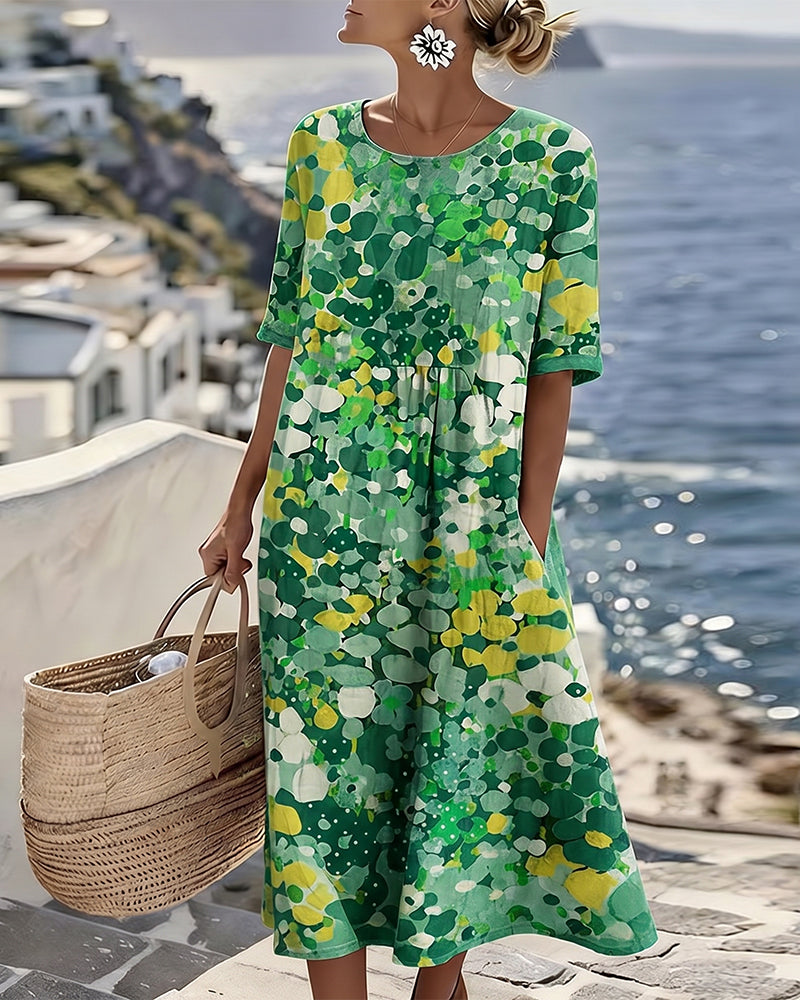 Comfortable women's floral midi dress with short sleeves & round neck, ideal for spring casual style.