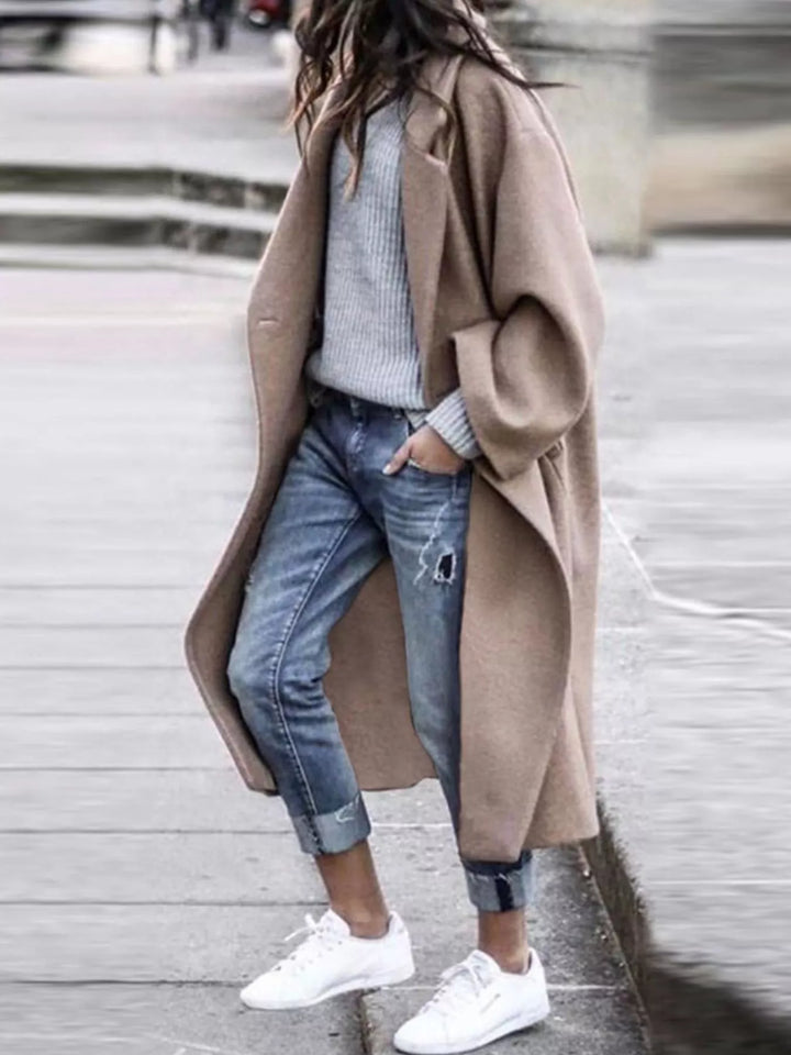 Cozy blue women's long winter coat, oversized for ultimate comfort and chic winter fashion.