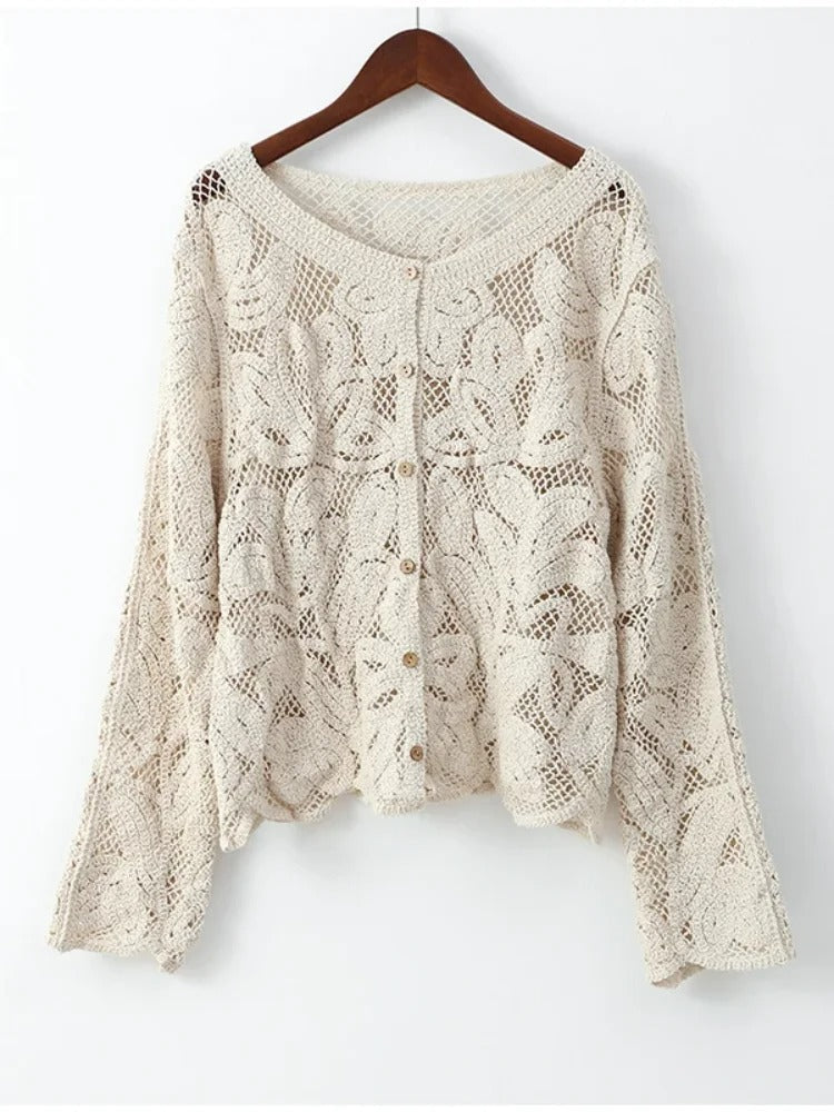 Airy crocheted apricot cardigan for women, elegant and lightweight summer layering top. Handcrafted chic style.