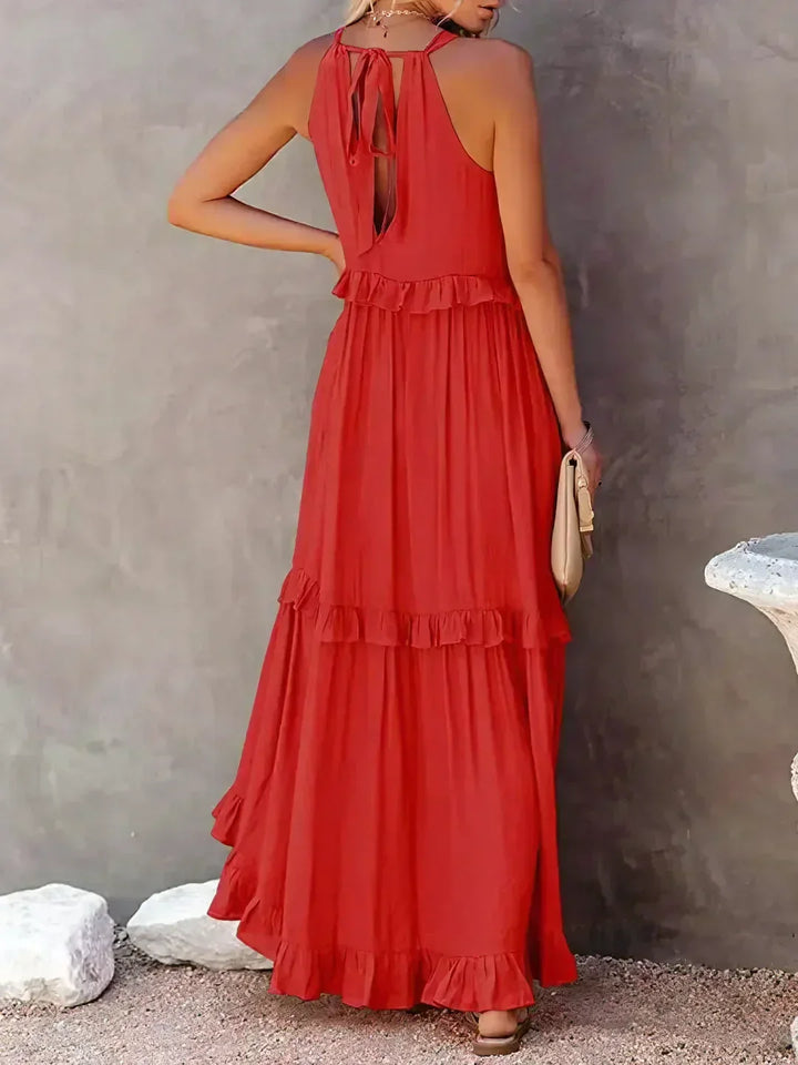 Summer casual halterneck maxi dress, with ruffles and functional pockets, flowy design.