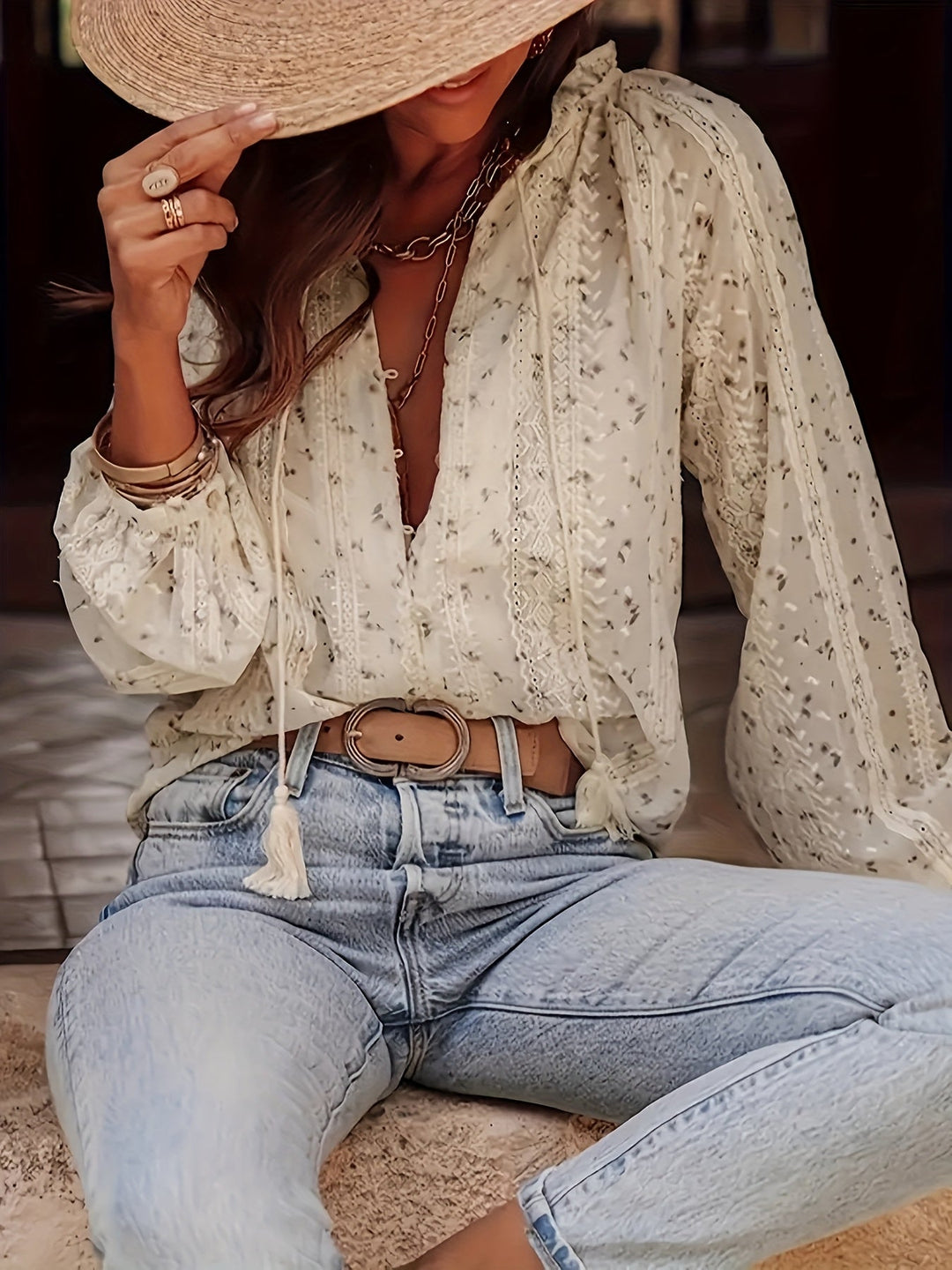 Sophisticated women's floral print V-neck blouse. Elegant spring/summer top for a relaxed, stylish office or casual look.