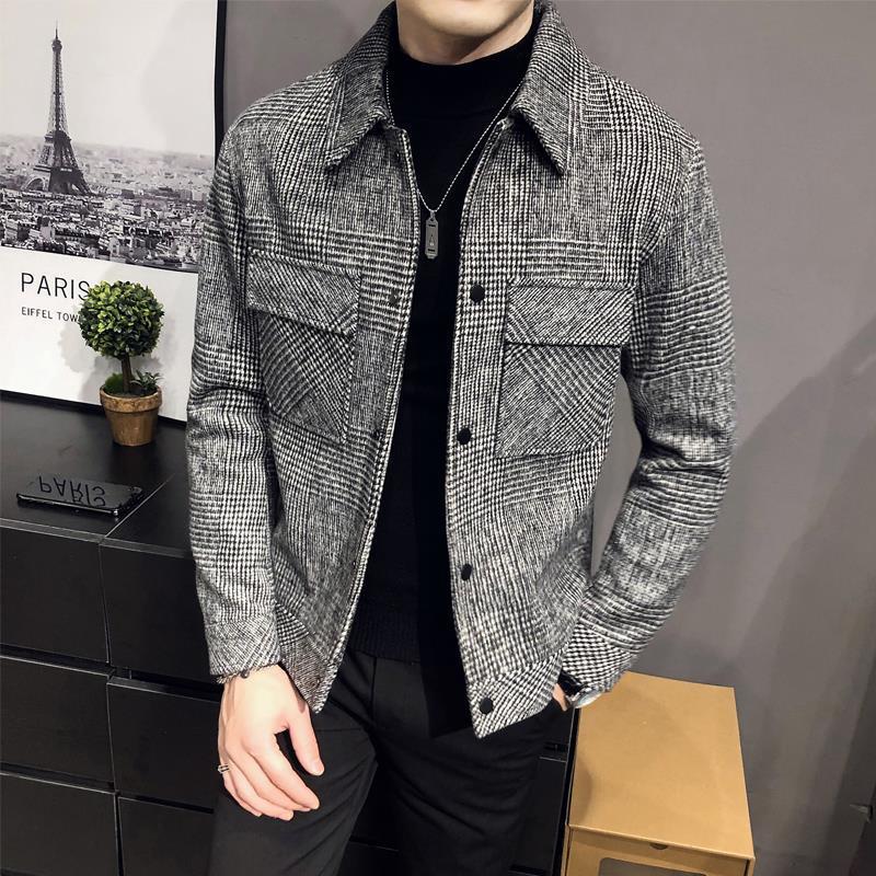 Stylish men's button-up plaid shirt jacket. Comfortable outerwear for fall and winter fashion.