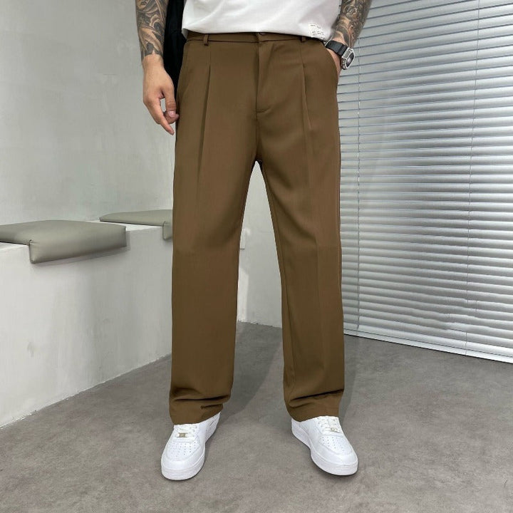 Men's wide-leg dress trousers with double pleats in a sophisticated gray, perfect for formal or smart casual wear.