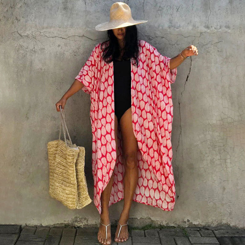 Glamorous women's sun protection cover up, stylish one-size resort wear for beach days.