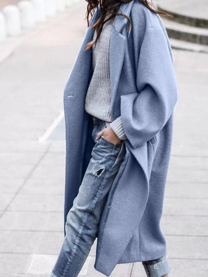 Chic blue women's oversized long coat, perfect for combining casual style with winter comfort.