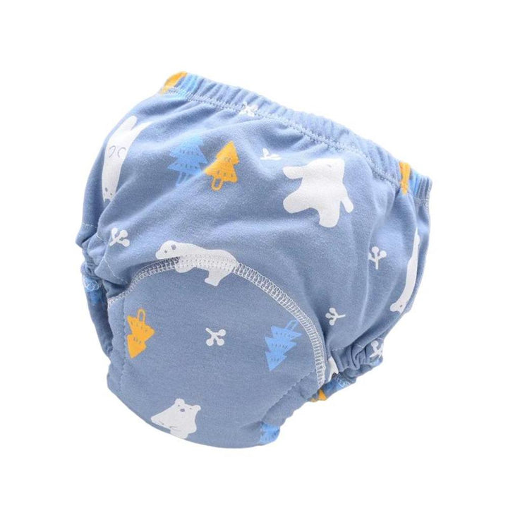 Happy baby wearing a comfortable, leak-proof reusable swim diaper, splashing in the pool.