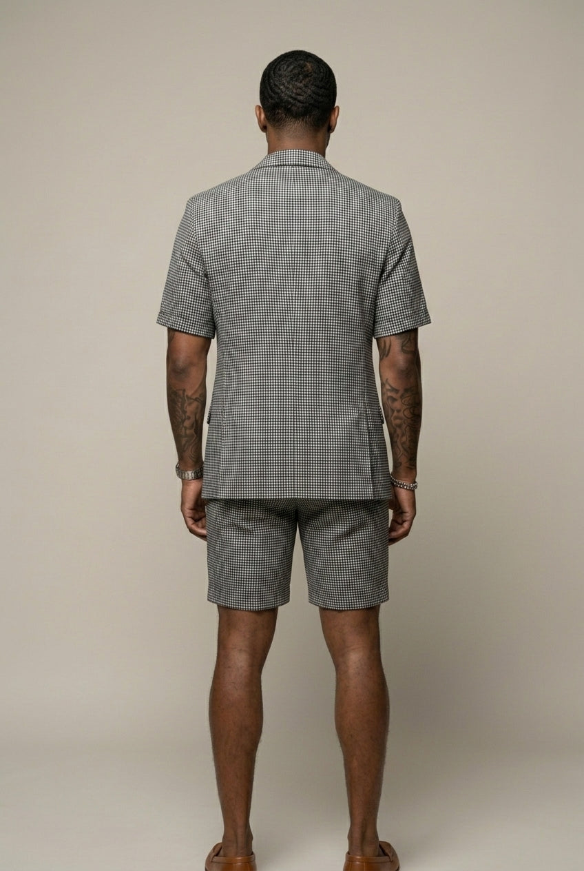 Stylish men's slim-fit two-piece check set with short sleeve blazer and matching shorts for modern fashion.