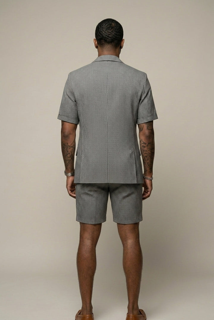 Stylish men's slim-fit two-piece check set with short sleeve blazer and matching shorts for modern fashion.
