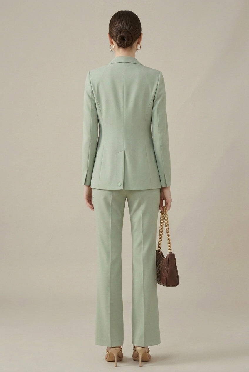 Business professional women's pant suit with tailored blazer & trousers, ideal for formal office wear.