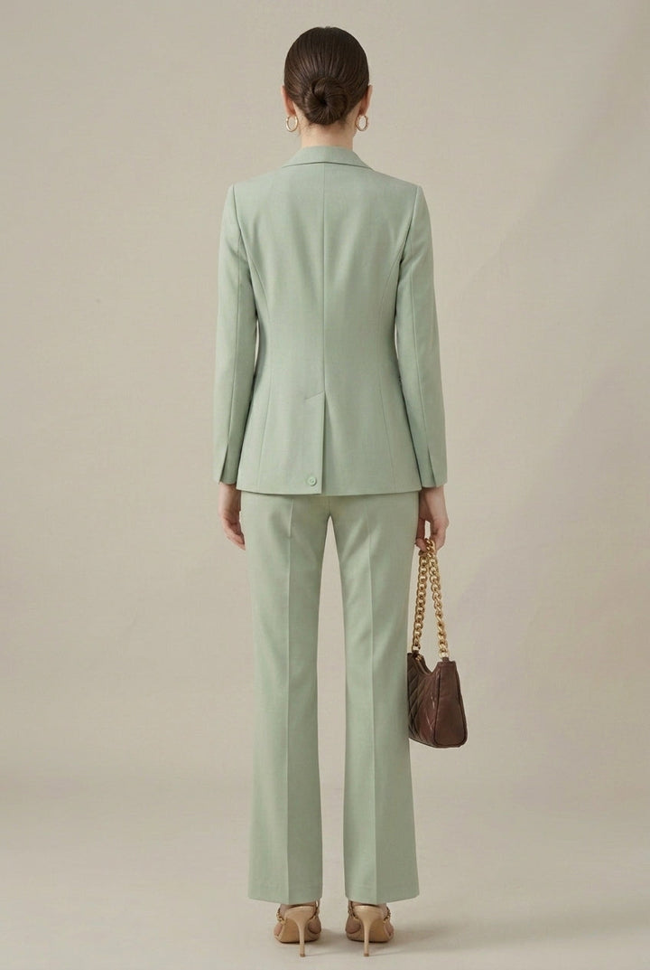 Business professional women's pant suit with tailored blazer & trousers, ideal for formal office wear.