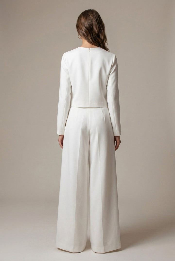 Stylish woman in a two-piece wide-leg palazzo outfit, versatile for casual outings or elegant workwear.