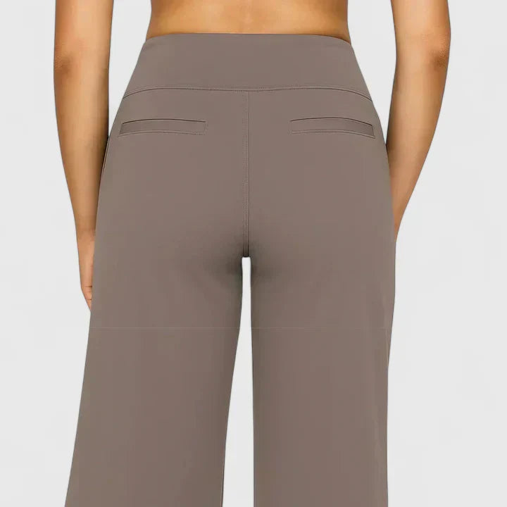 Stylish women's straight leg trousers with practical pockets, suitable for work or casual fashion.