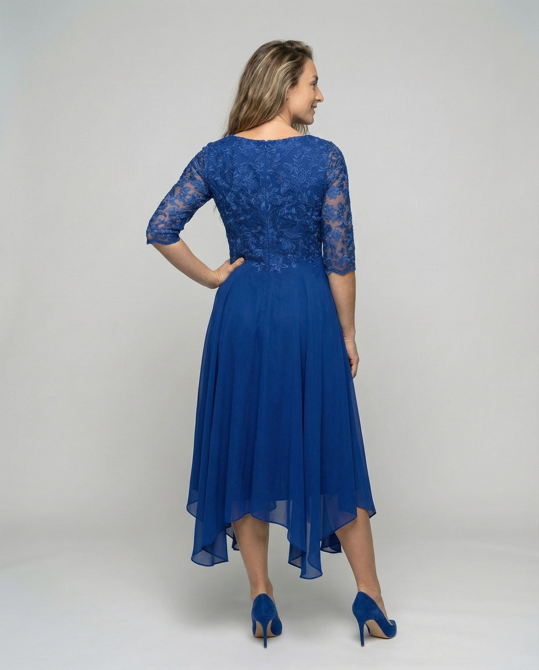 Classic mid-length embroidered dress for women. Elegant formal wear, perfect for wedding guest events.