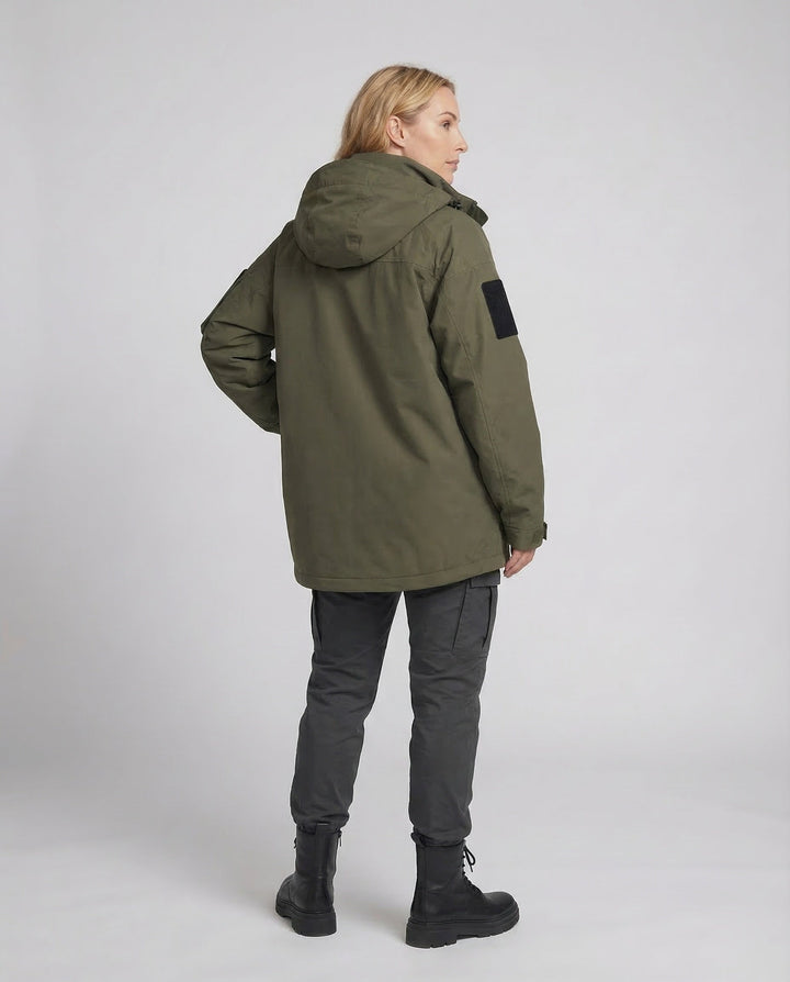 Stylish women's oversized waterproof zipped jacket. Essential outerwear for casual style & all-weather outdoor comfort.