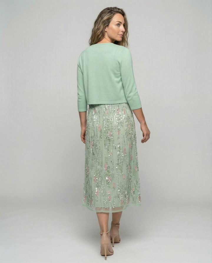 Vibrant floral two-piece midi dress for women, a stylish green summer dress for all occasions and elegant feminine wear.