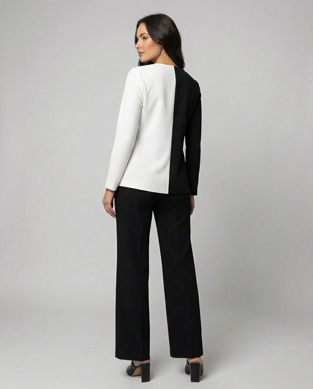 Women's elegant two-piece outfit with an asymmetrical blouse & wide-leg palazzo pants. Ideal for evening.