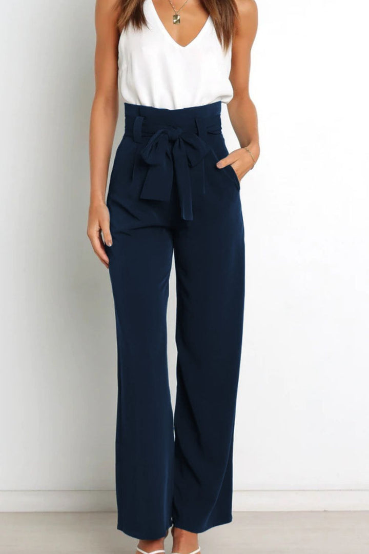 Women's high waist paperbag pants with stylish bow detail, perfect for office or casual wear.