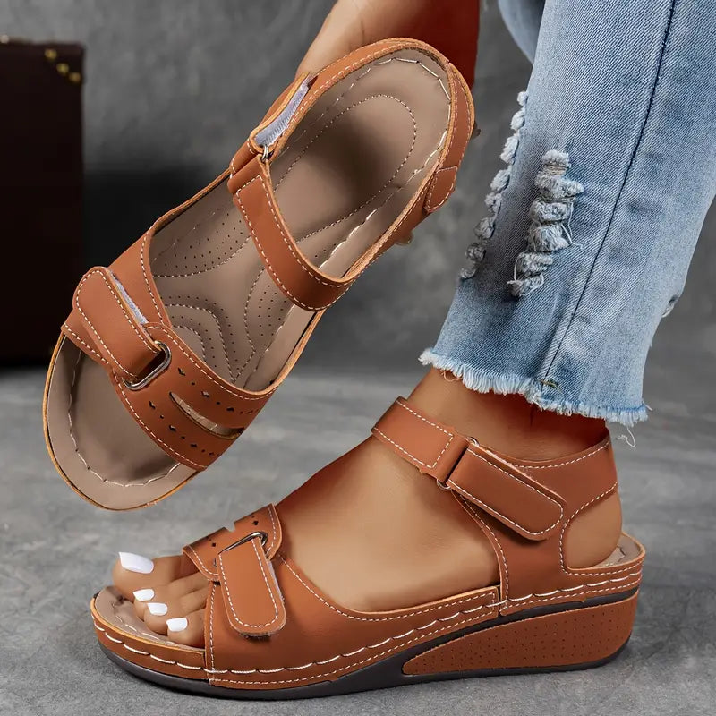 Ladies' comfortable platform open toe sandals, designed with a secure ankle strap for fashion.