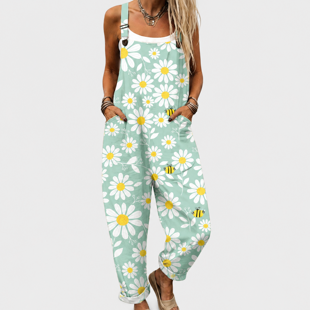 Women's comfortable floral printed wide-leg jumpsuit with adjustable straps, perfect for summer casual wear.