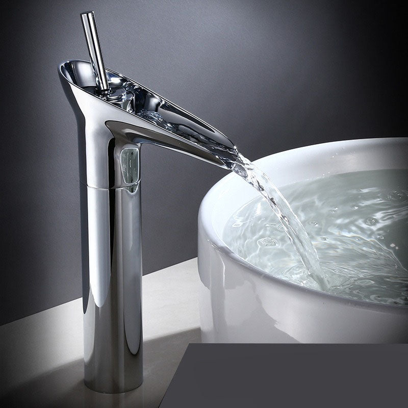 Single handle brass waterfall faucet, precise control for bathroom basins.
