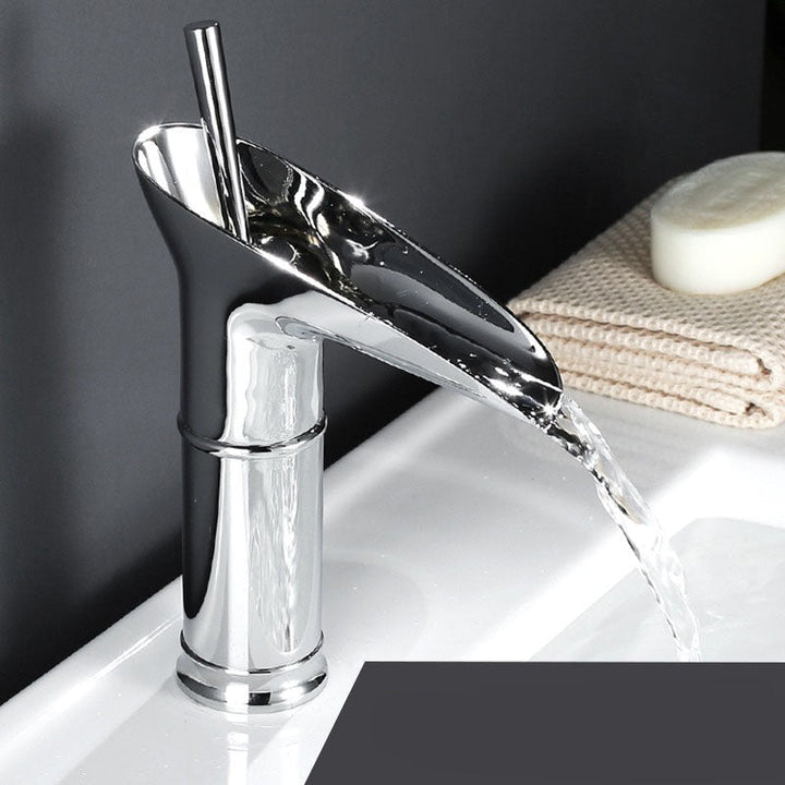 Premium brass waterfall mixer, sophisticated design for elegant bathrooms.