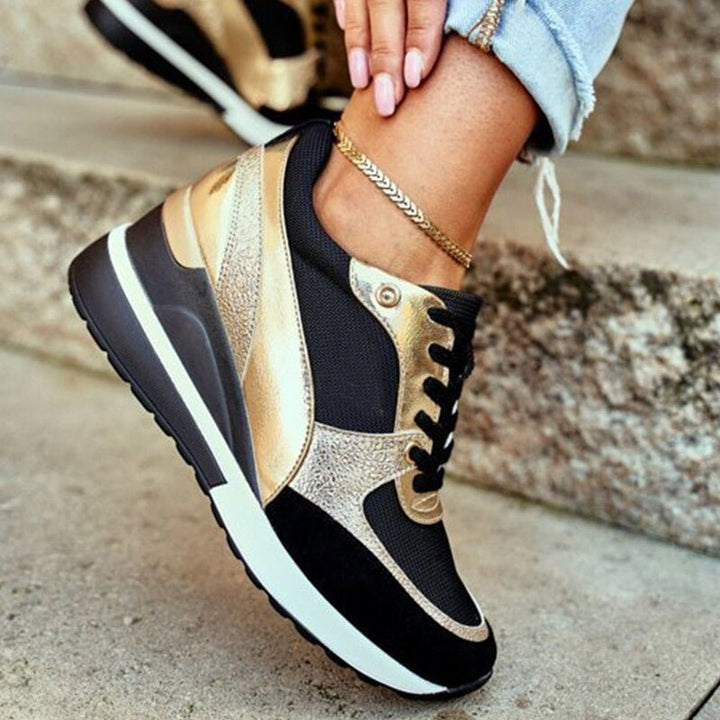 Elegant women's orthopedic sneakers with a lifted sole. Enjoy comfort and support in these stylish casual shoes.