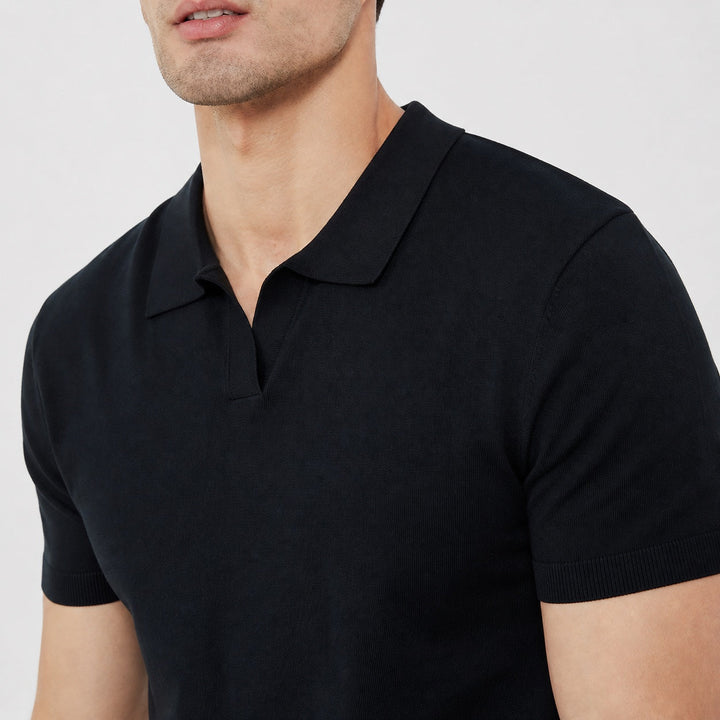 Refined men's short sleeve polo shirt. Features open collar, perfect for smart casual fashion.
