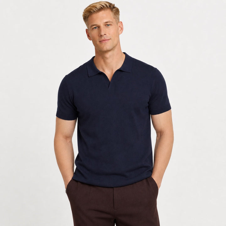 Wardrobe essential men's open collar polo. Short sleeve smart casual shirt for refined everyday wear.