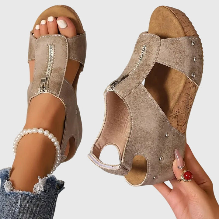 Zippered women's orthopaedic sandals offering comfort, arch support, and stable footing for summer walks.