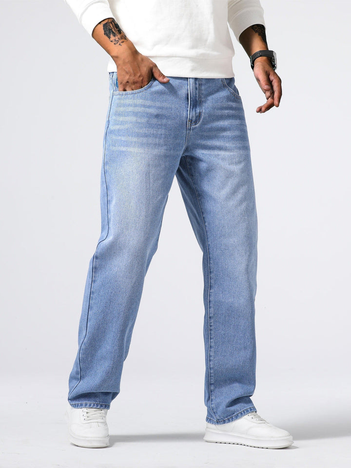 Classic washed denim men's straight leg jeans. Comfortable, timeless fit for everyday casual pants.