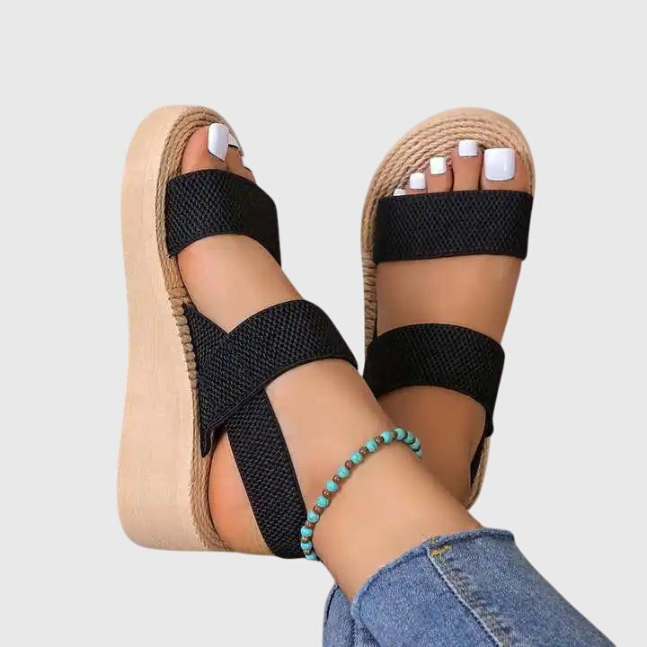 Stylish women's platform orthopedic sandals with arch support, slingback design for foot support.