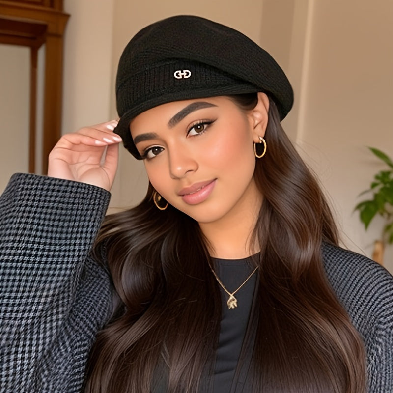Warm knitted beret for women. A chic winter hat, perfect for elegant cold weather style.