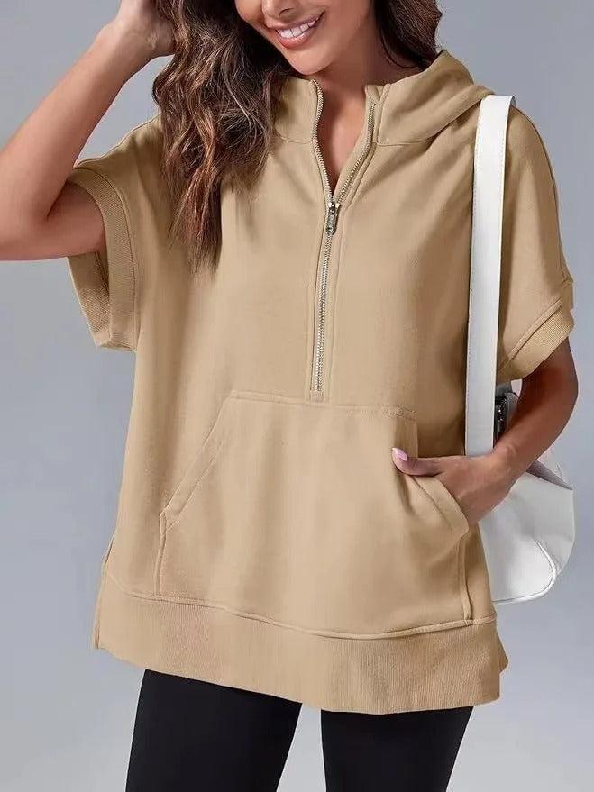 Women's half-zip short sleeve hoodie featuring a comfy hood & functional front pockets.