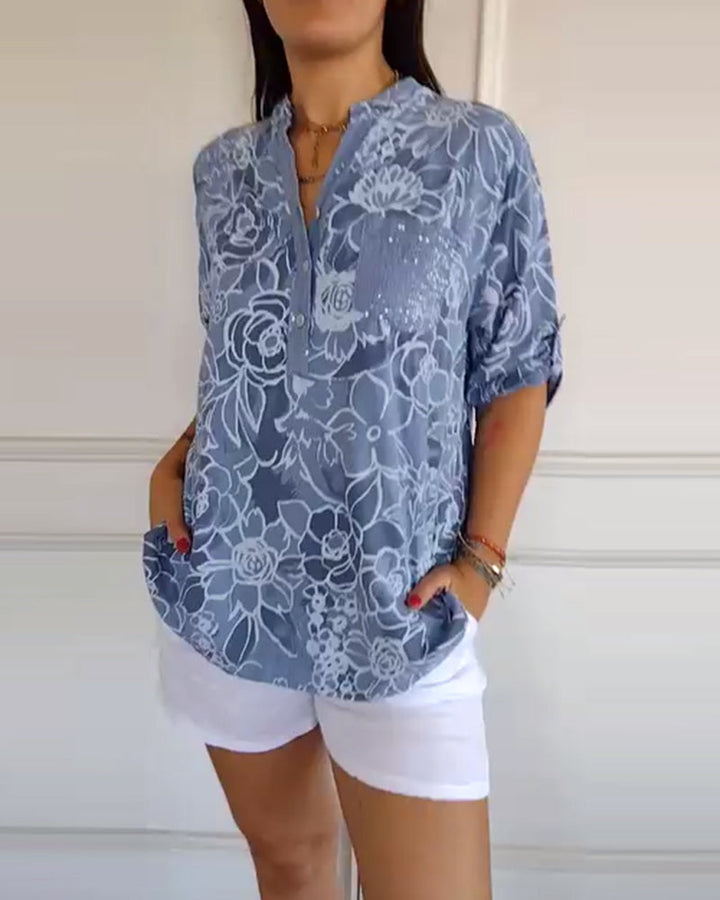 Women's elegant floral blouse with relaxed fit, perfect for spring and summer everyday wear.