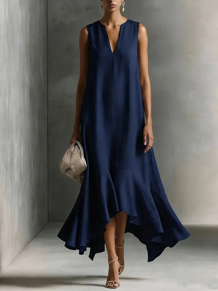 Women's elegant long maxi dress, V-neck sleeveless design, flowing for summer comfort.