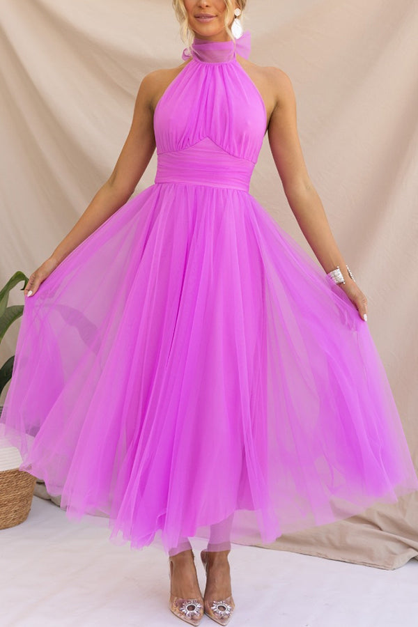Women's long skirt midi dress, perfect as a chic wedding guest outfit.