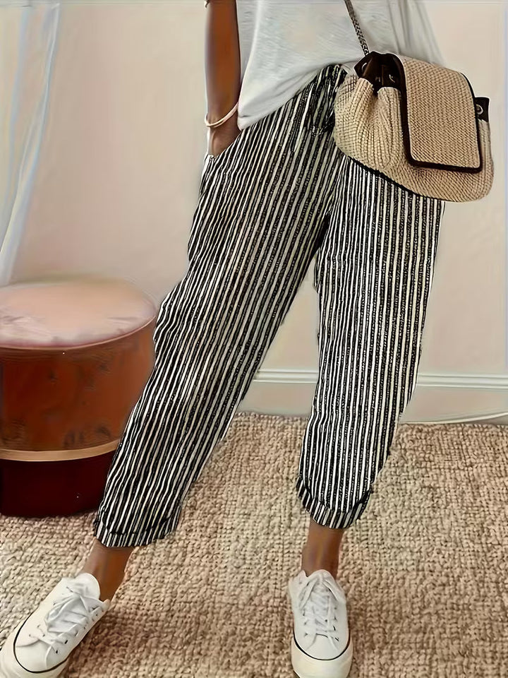 Relaxed fit women's wide-leg striped casual pants, ideal for comfortable and chic everyday fashion.