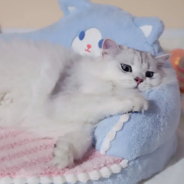 Ultra-soft plush pet bed for small dogs and cats, designed with a supportive backrest for cozy, restful sleep.